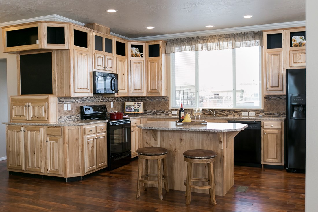 The THE SPRUCE Kitchen. This Manufactured Mobile Home features 3 bedrooms and 2 baths.