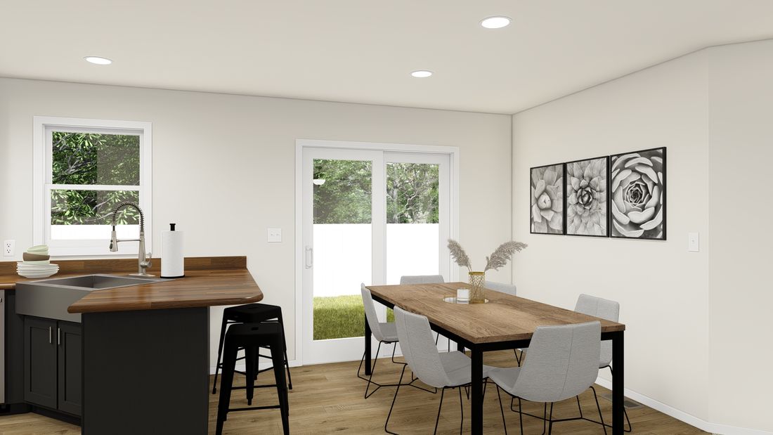 The DRM483F 48'              DREAM Dining Area. This Manufactured Mobile Home features 3 bedrooms and 2 baths.