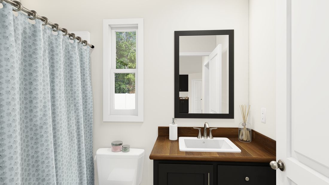 The DRM483F 48'              DREAM Guest Bathroom. This Manufactured Mobile Home features 3 bedrooms and 2 baths.