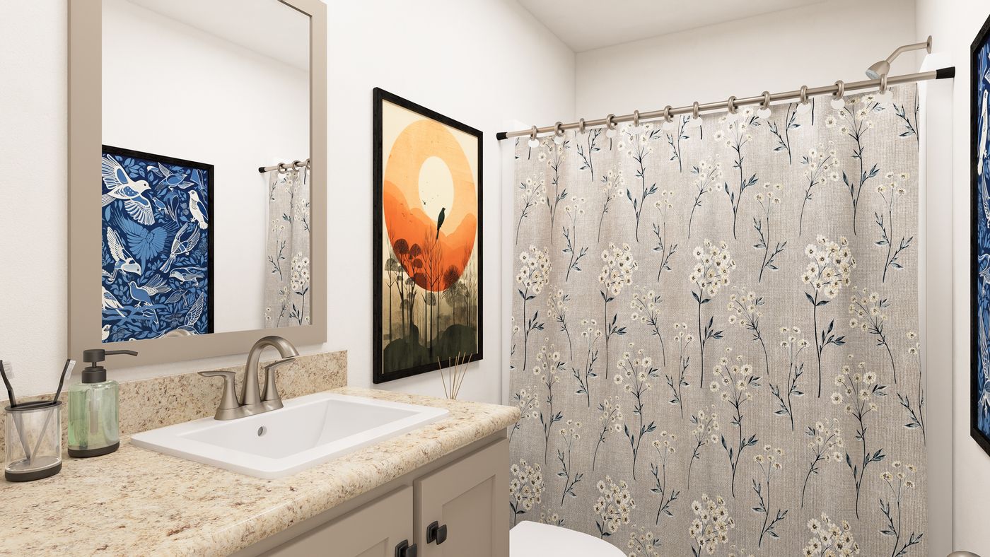 The DRM682F 68' DREAM Guest Bathroom. This Manufactured Mobile Home features 4 bedrooms and 2 baths.