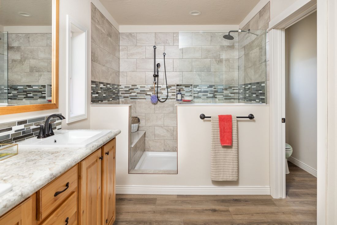 The TH601F                 CLAYTON Primary Bathroom. This Manufactured Mobile Home features 3 bedrooms and 2 baths.