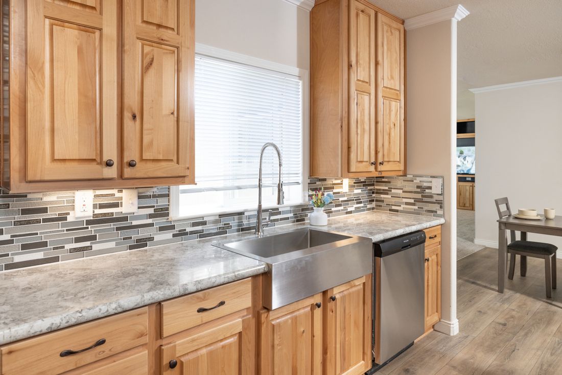 The TH601F                 CLAYTON Kitchen. This Manufactured Mobile Home features 3 bedrooms and 2 baths.