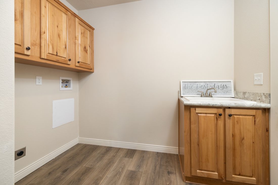 The TH601F                 CLAYTON Utility Room. This Manufactured Mobile Home features 3 bedrooms and 2 baths.