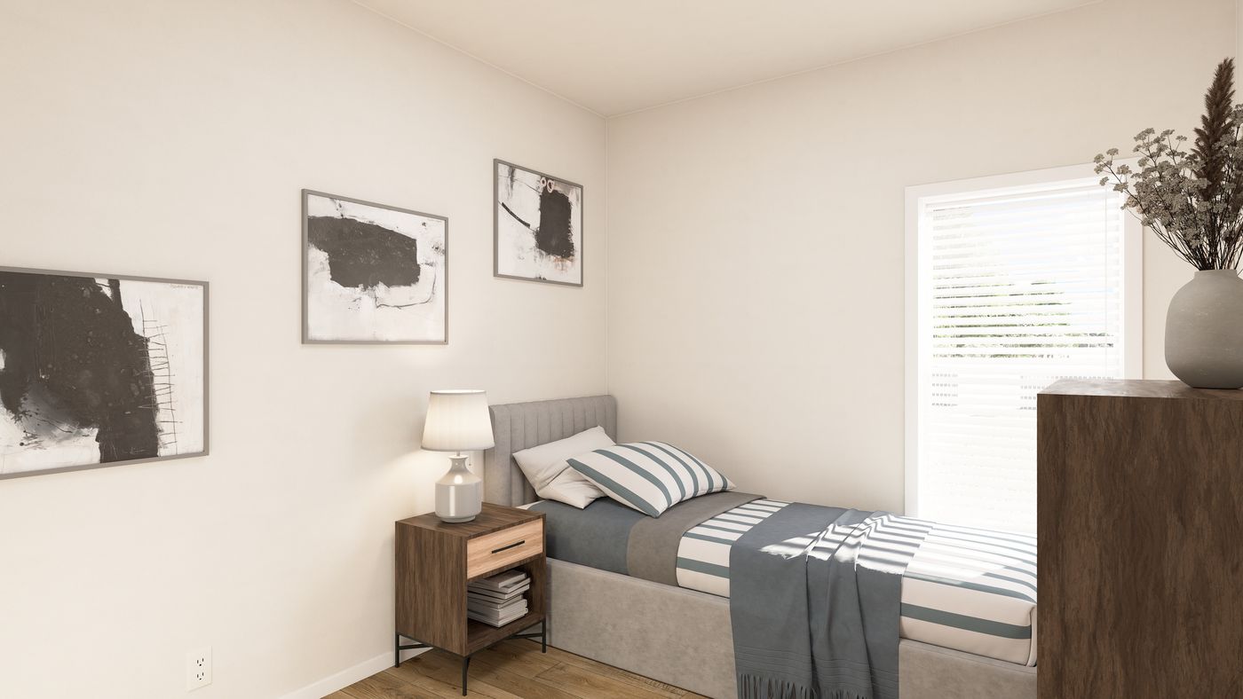 The PREFERRED PLUS CP561F Bedroom. This Manufactured Mobile Home features 3 bedrooms and 2 baths.