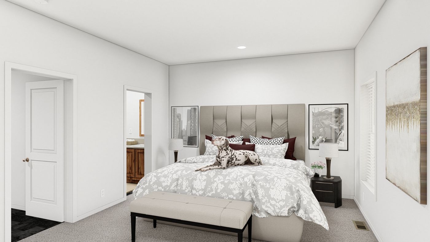 The DRM683F 68'              DREAM Primary Bedroom. This Manufactured Mobile Home features 3 bedrooms and 2 baths.