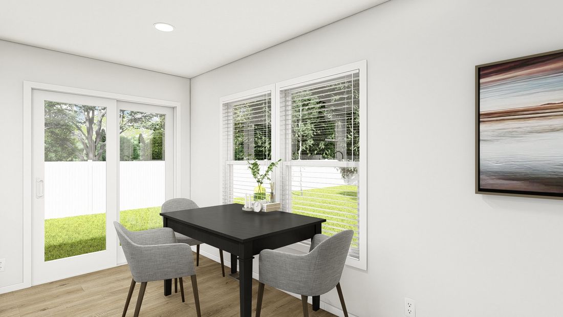 The DRM484F 48'              DREAM Dining Area. This Manufactured Mobile Home features 4 bedrooms and 2 baths.