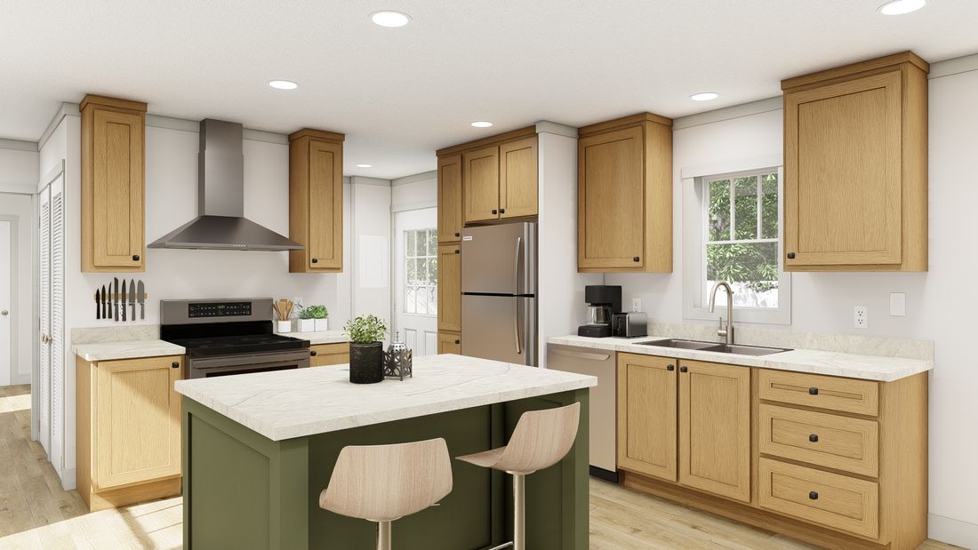 The 1676 SWEET CAROLINE Kitchen. This Manufactured Mobile Home features 3 bedrooms and 2 baths.
