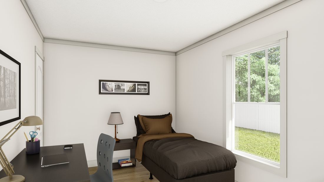 The 1676 SWEET CAROLINE Guest Bedroom. This Manufactured Mobile Home features 3 bedrooms and 2 baths.