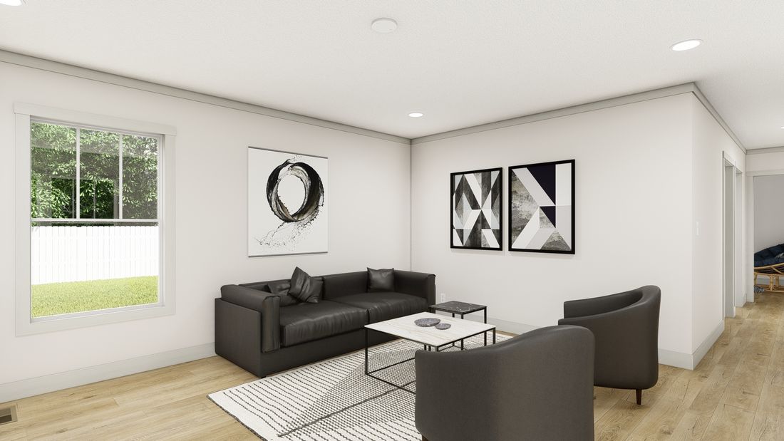 The 1676 SWEET CAROLINE Living Room. This Manufactured Mobile Home features 3 bedrooms and 2 baths.