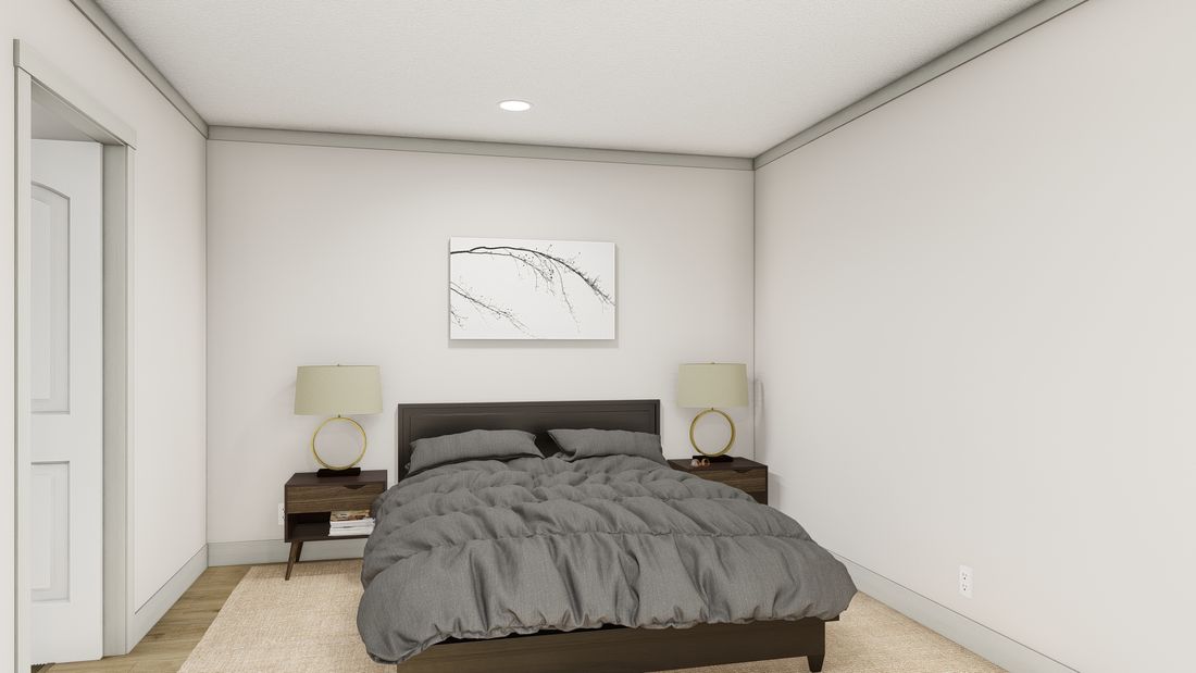 The 1676 SWEET CAROLINE Primary Bedroom. This Manufactured Mobile Home features 3 bedrooms and 2 baths.