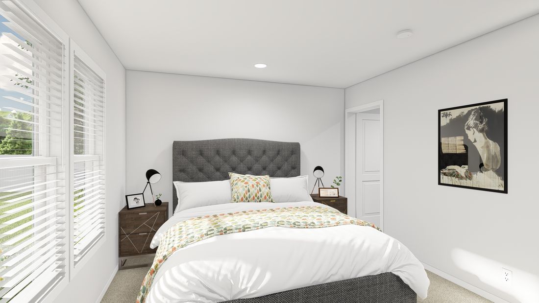 The DRM386A 2438'            DREAM Primary Bedroom. This Manufactured Mobile Home features 2 bedrooms and 2 baths.