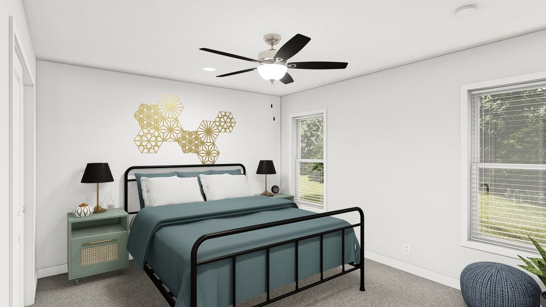 The DRM482P 2048'            DREAM Primary Bedroom. This Manufactured Mobile Home features 2 bedrooms and 2 baths.