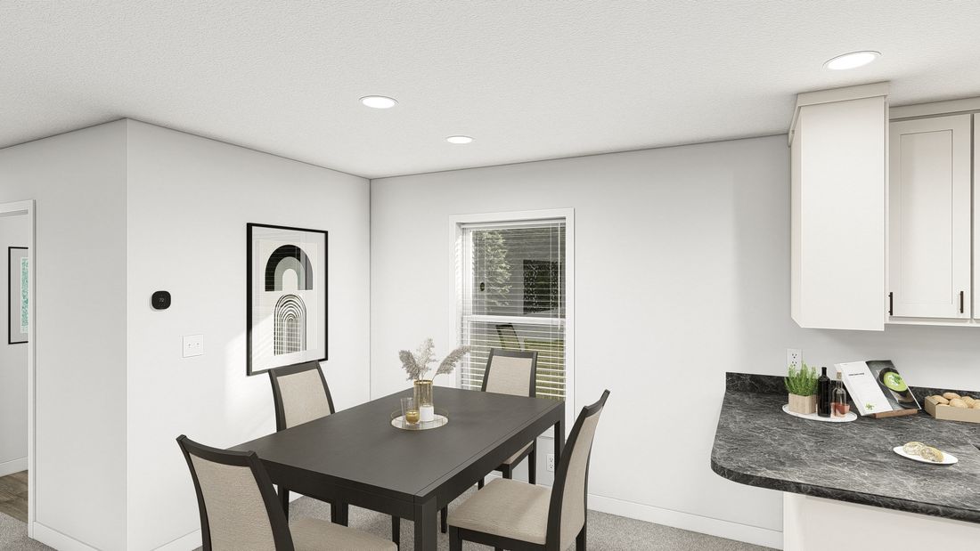 The DRM482P 2048'            DREAM Dining Area. This Manufactured Mobile Home features 2 bedrooms and 2 baths.