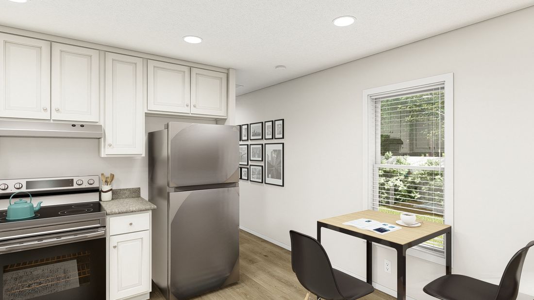 The DRM481M 48'              DREAM Dining Area. This Manufactured Mobile Home features 2 bedrooms and 1 bath.
