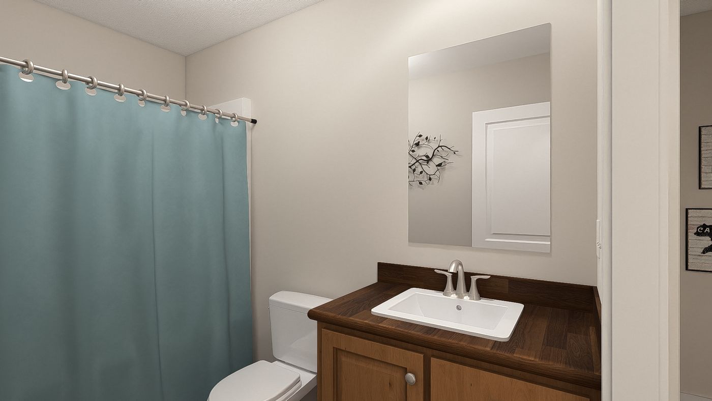 The DRM561M 56'              DREAM Guest Bathroom. This Manufactured Mobile Home features 2 bedrooms and 1 bath.