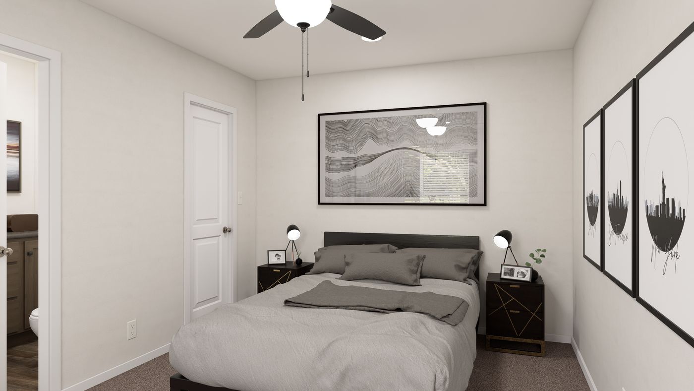 The DRM661N 1566' DREAM Primary Bedroom. This Manufactured Mobile Home features 3 bedrooms and 2 baths.