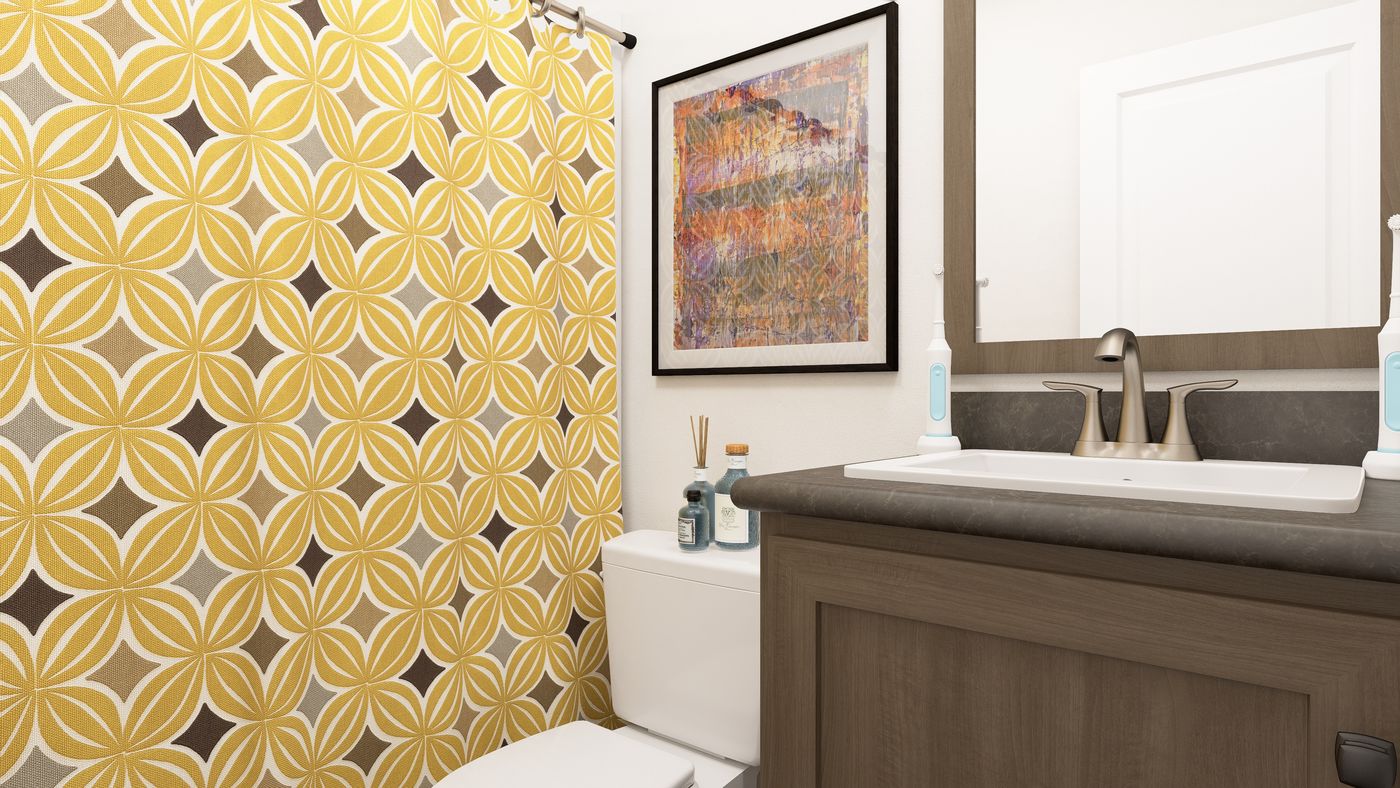 The DRM661N 1566' DREAM Guest Bathroom. This Manufactured Mobile Home features 3 bedrooms and 2 baths.