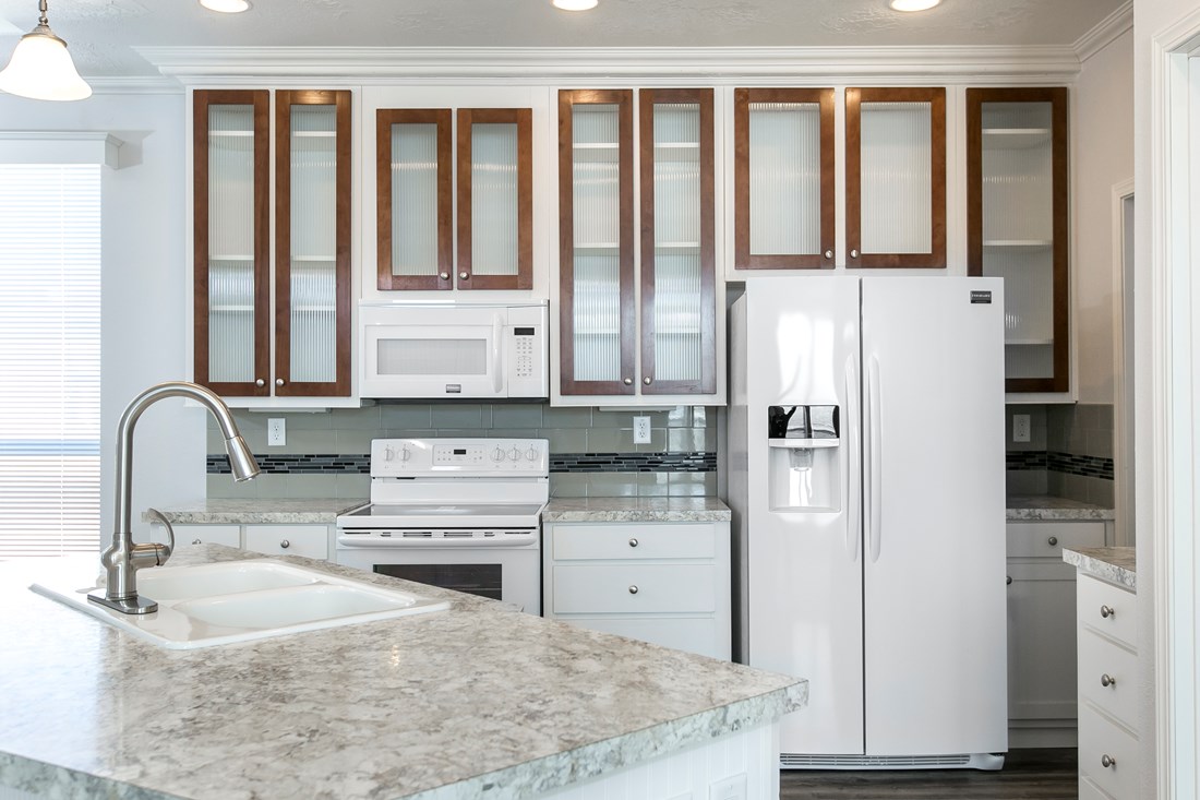 The ING681F EUCALYPTUS   (FULL) GW Kitchen. This Manufactured Mobile Home features 3 bedrooms and 2 baths.